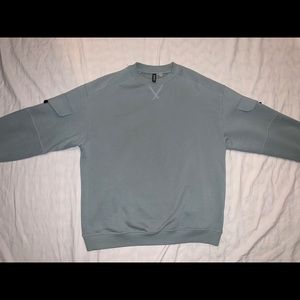 Sleeve Pocket Crew Neck